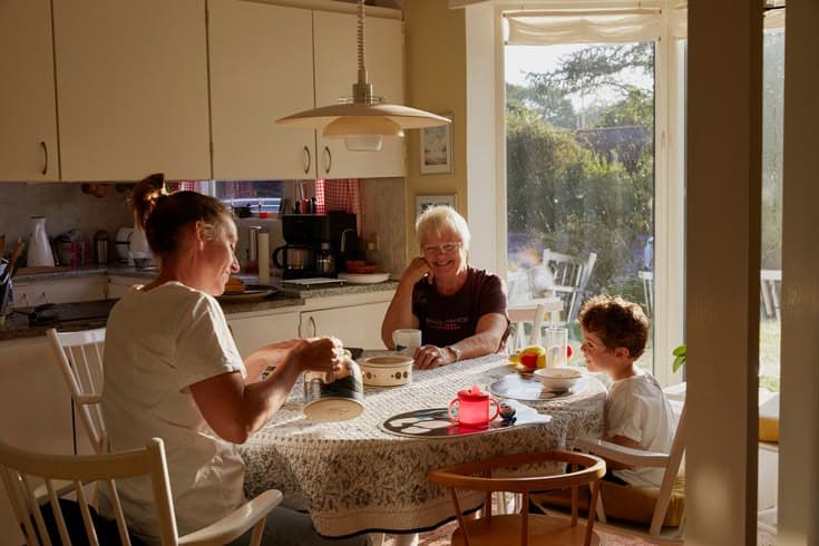 Support worker and participant in a warm home environment